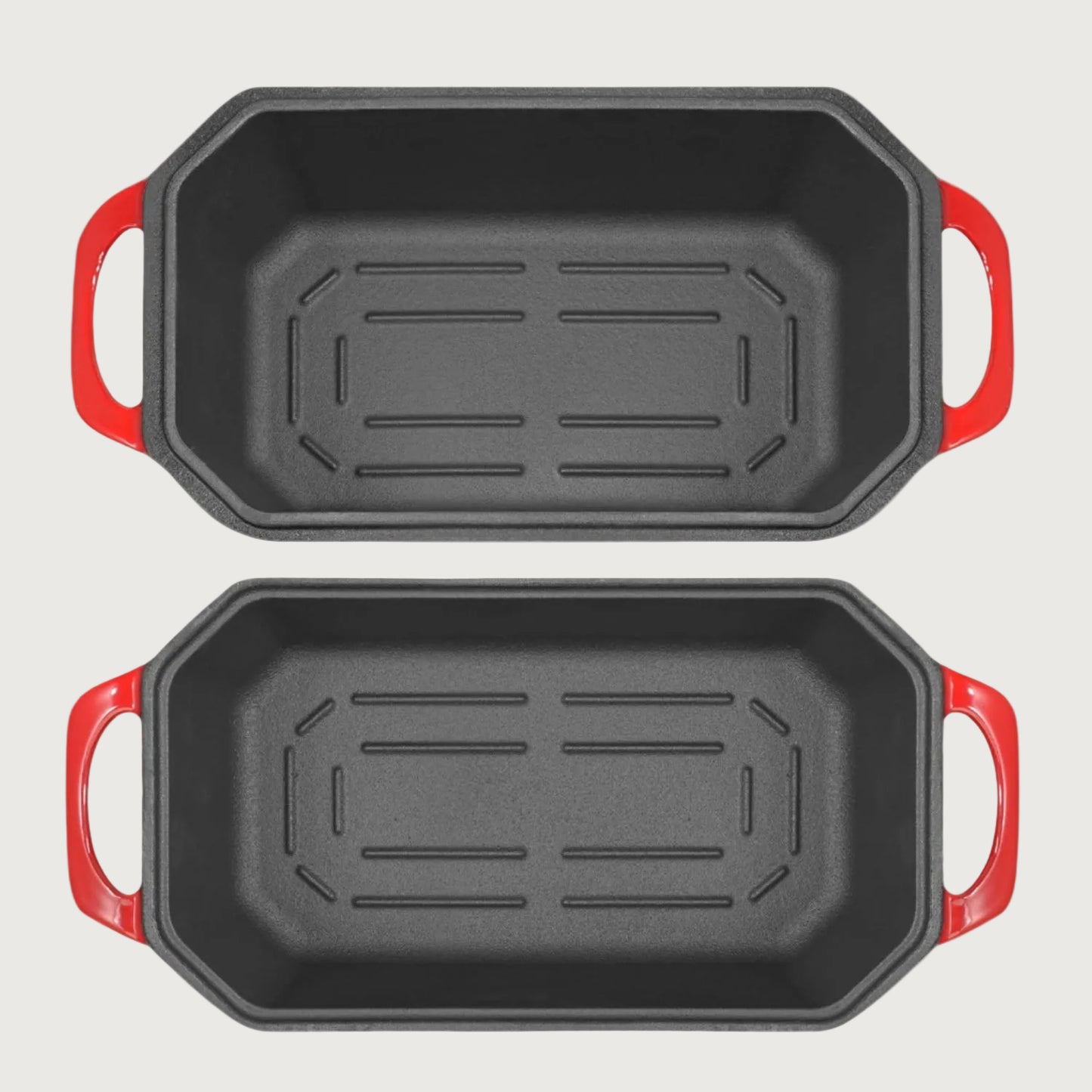 Two roasting pans double as cast iron loaf pan nz with red handles on a beige background