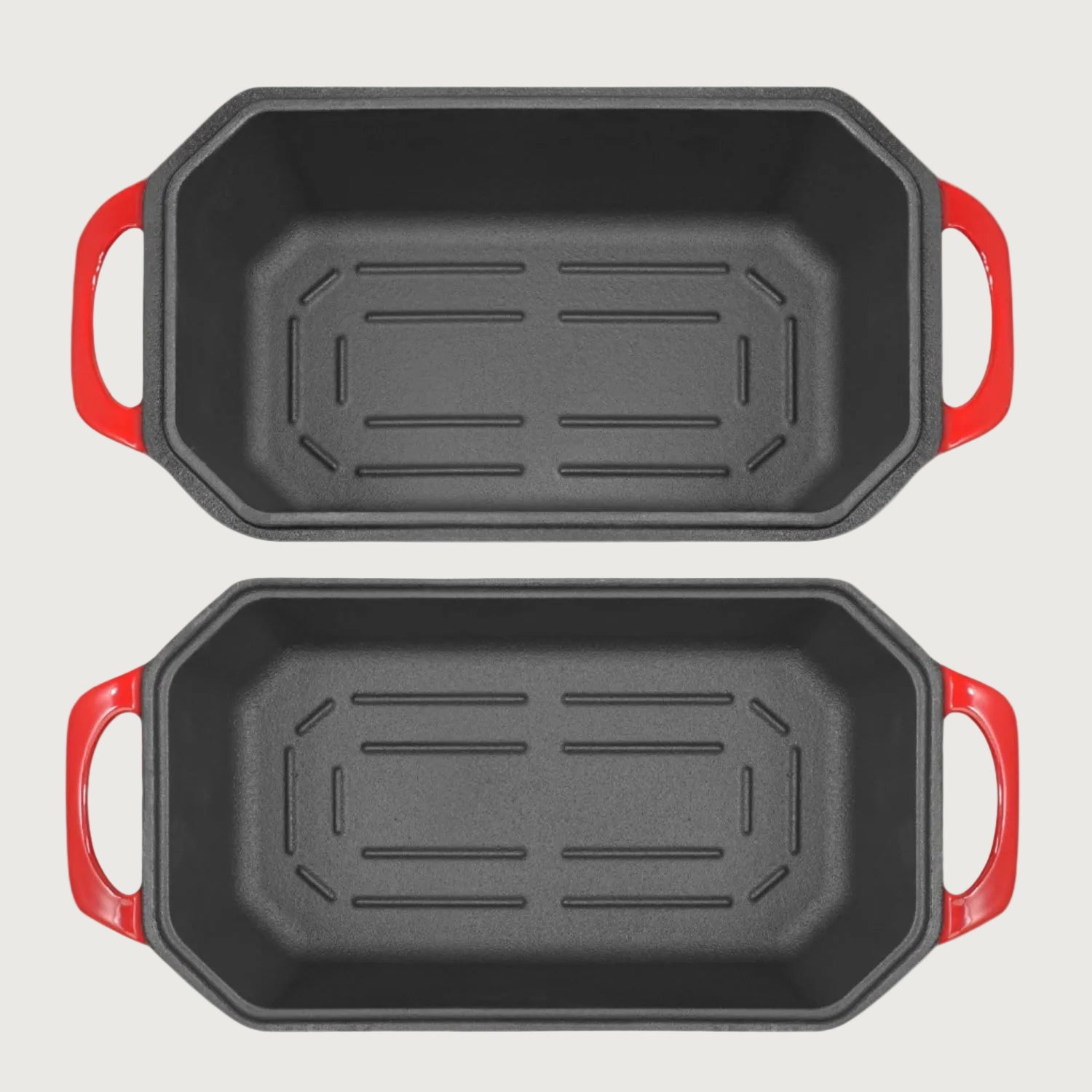 Two roasting pans double as cast iron loaf pan nz with red handles on a beige background