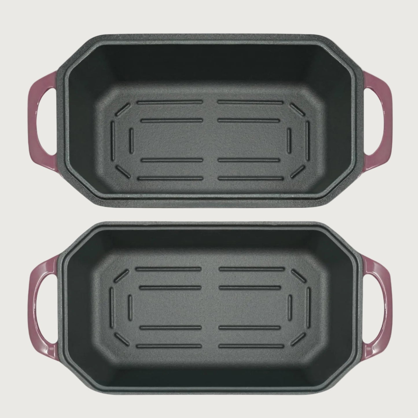 Two black rectangular baking pans with purple handles on a beige background