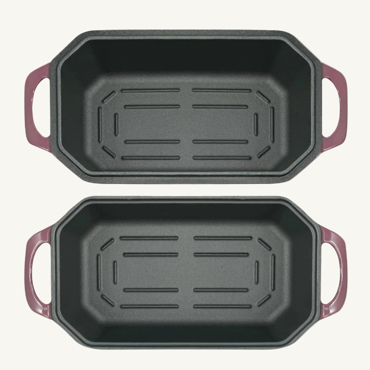 Two black rectangular baking pans with purple handles on a beige background