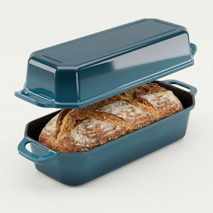 Blue bread pan with a loaf of bread inside on a white background