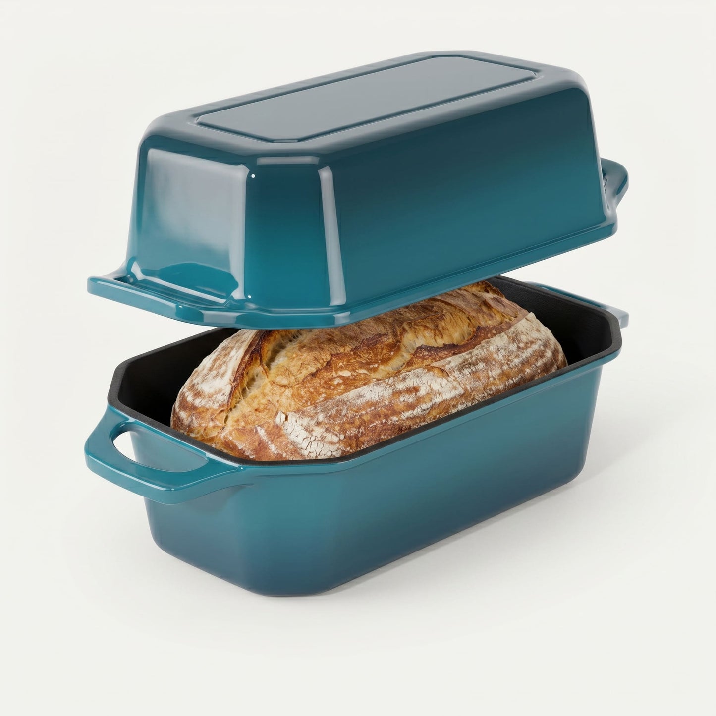 Teal bread loaf pan with a loaf of bread inside on a white background