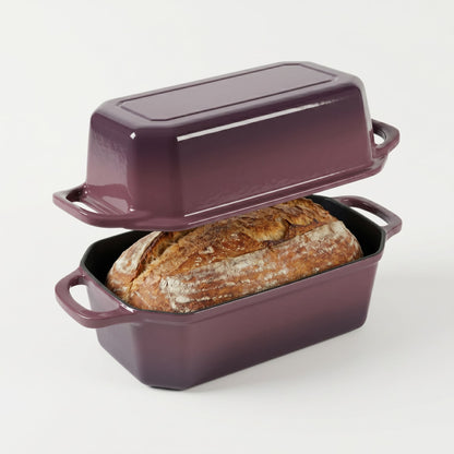 Purple bread loaf with a lid on a white background