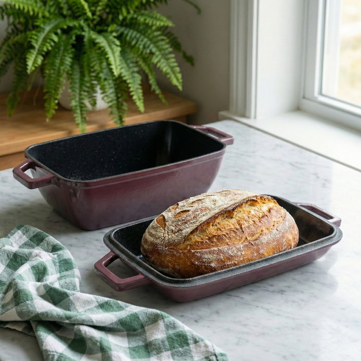 Plum purple oval bread oven with lid and base tray, featuring a baked loaf. Plum Purple (enamelled)
