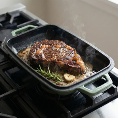 Oval bread oven on stovetop, baked loaf with rosemary and sizzling steam Sage Green (enamelled) 
