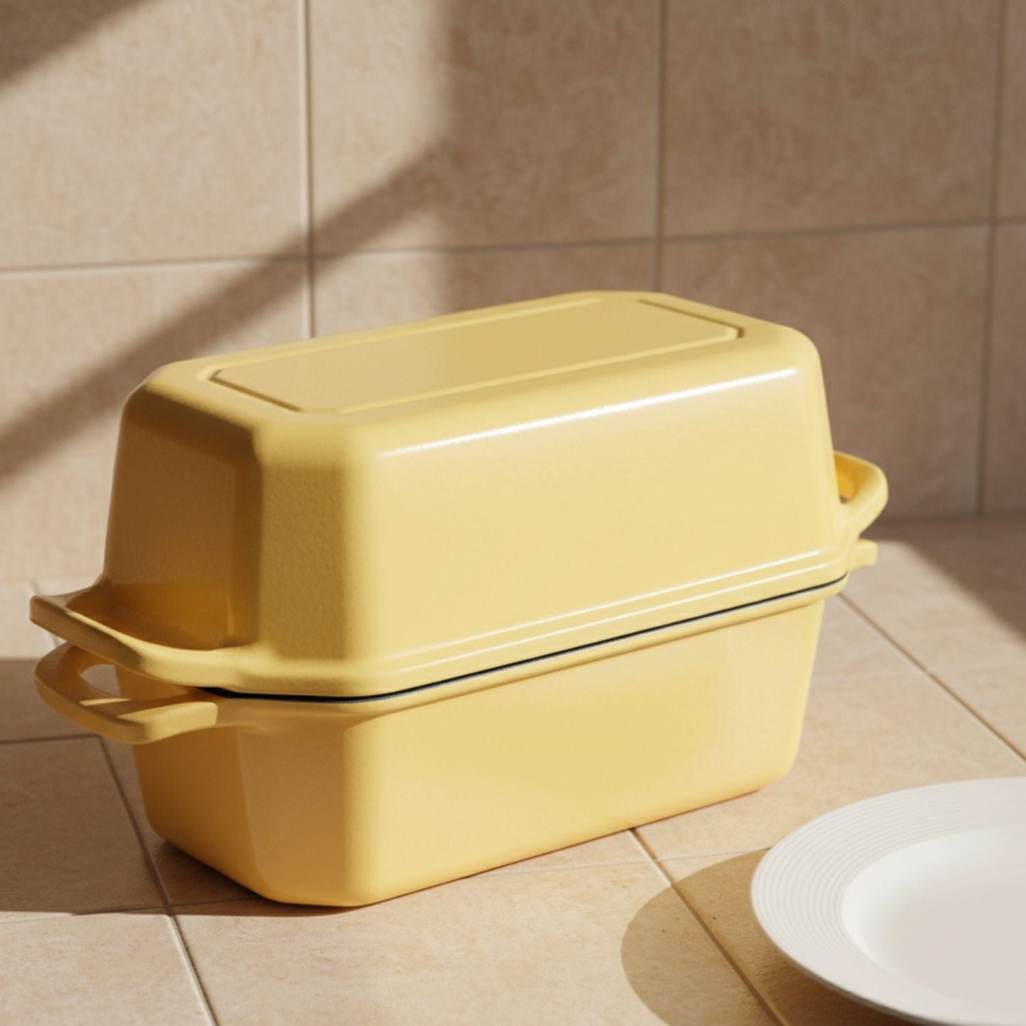 Yellow bread loaf pan set of 2 on a tiled kitchen