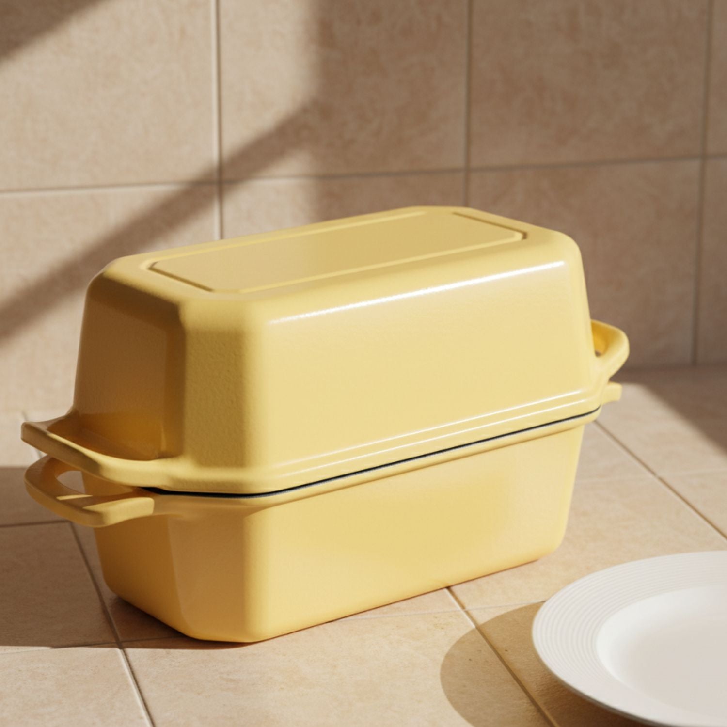 Yellow bread loaf pan set of 2 on a tiled kitchen