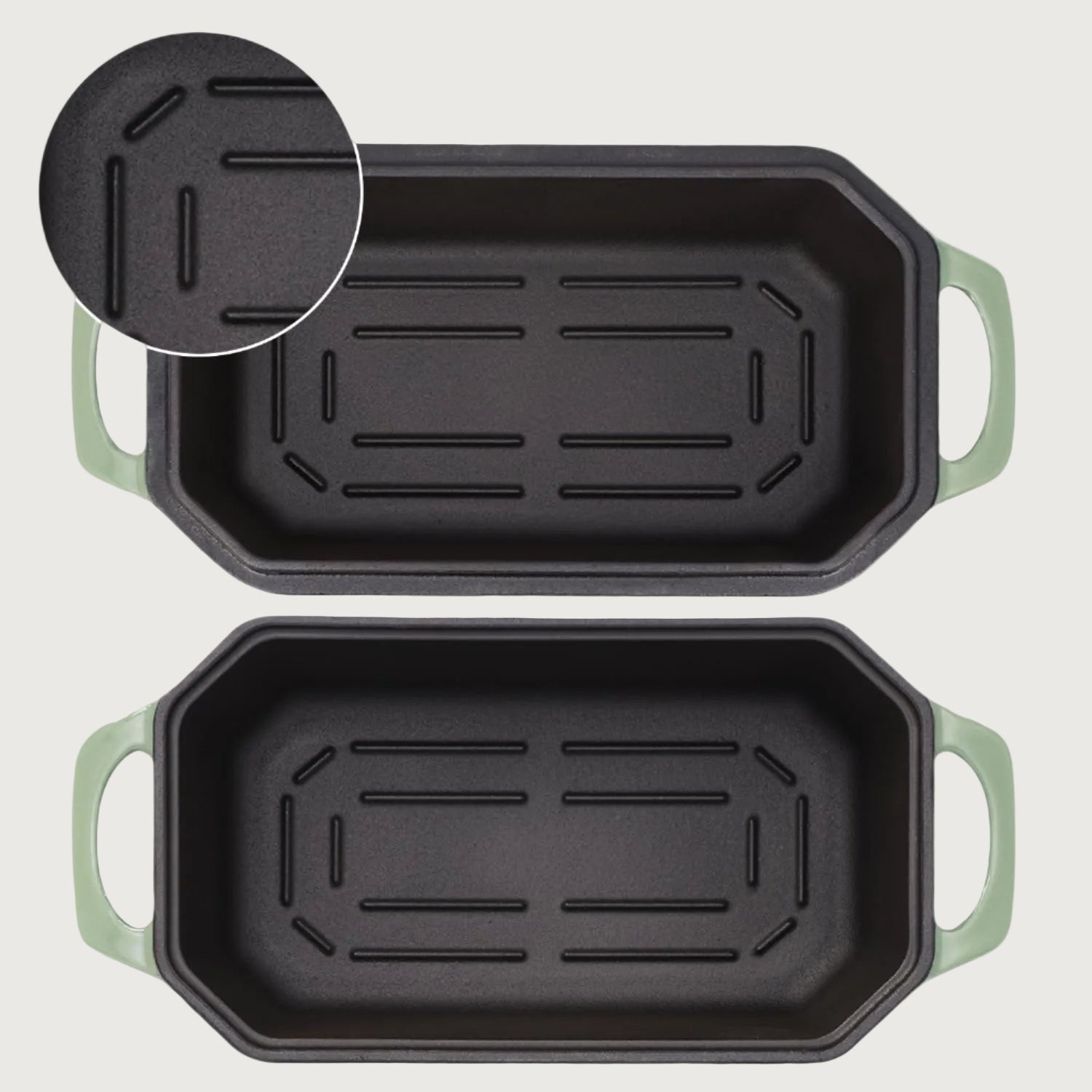 Two loaf pans with green handles on a white background, highlighting the design for easier bread removal.