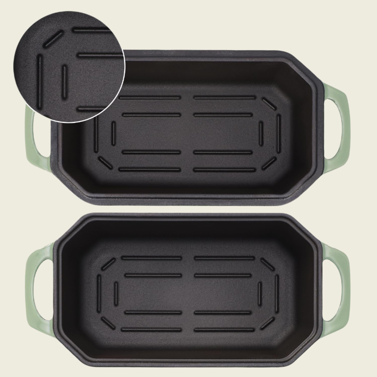 Two black loaf pans with green handles on a white background, highlighting the design for easier bread removal.