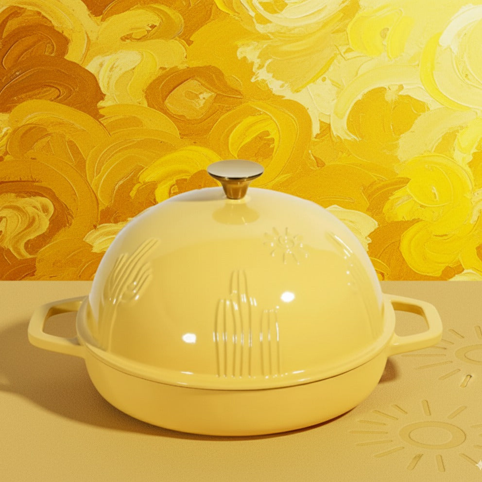 Yellow enameled cast iron dish with a dome lid on a yellow background